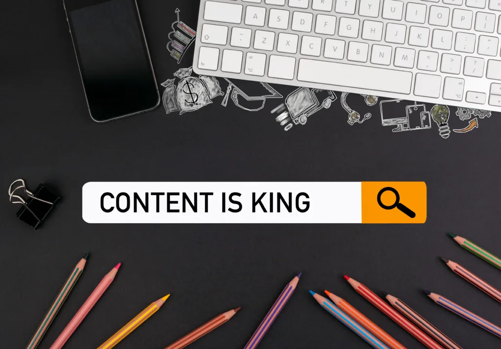 Content Is King on a search bar displayed on computer table